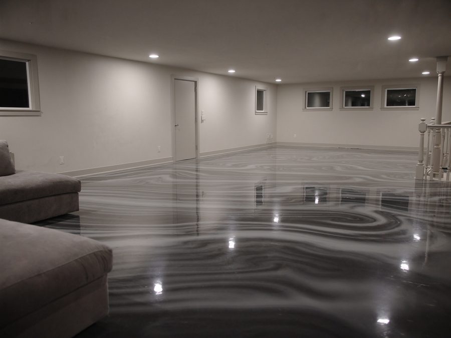 High-gloss metallic epoxy floor in a finished basement